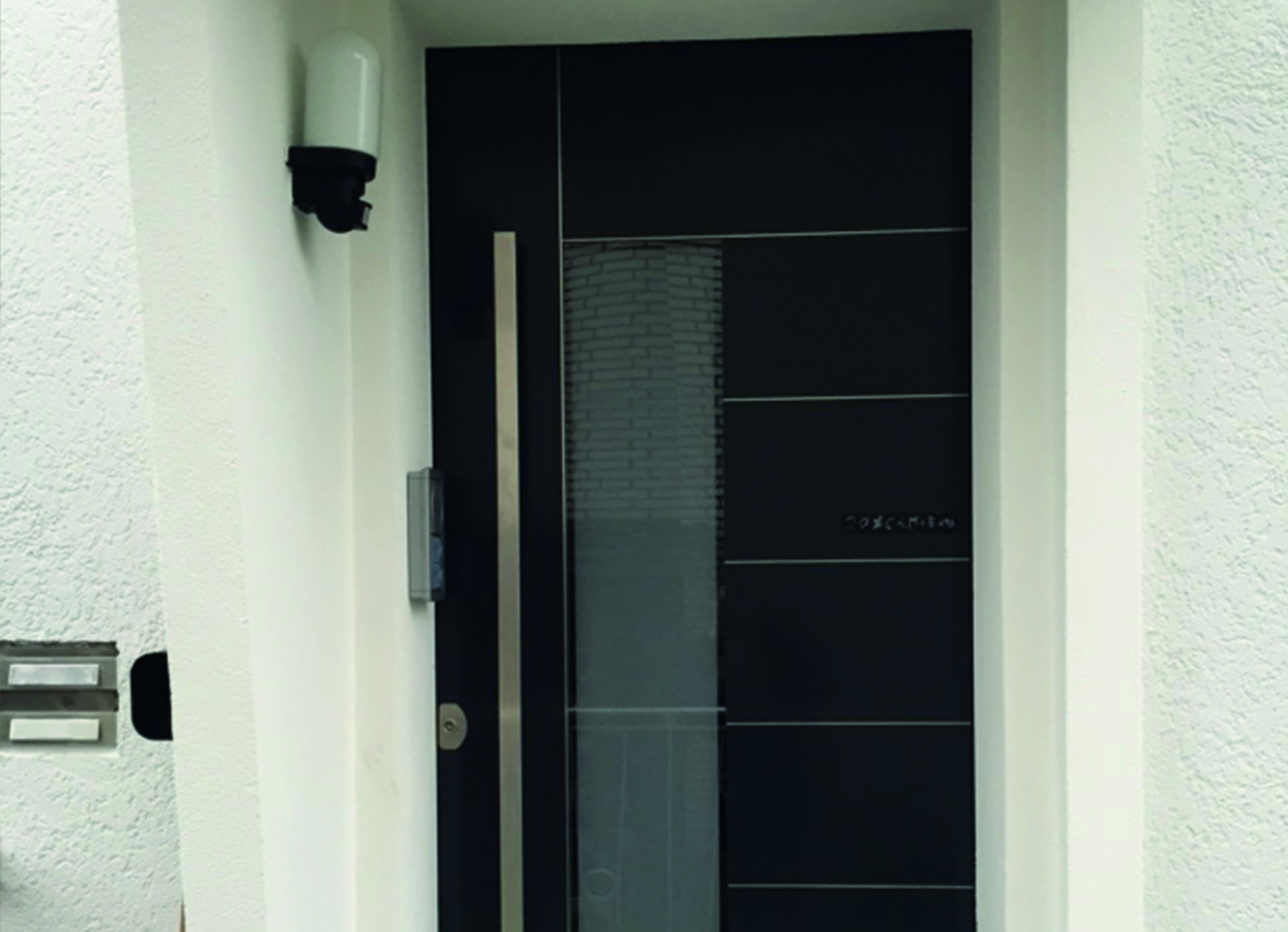 Herkenhoff Referenzen moderne anthrazitfarbene Haustür